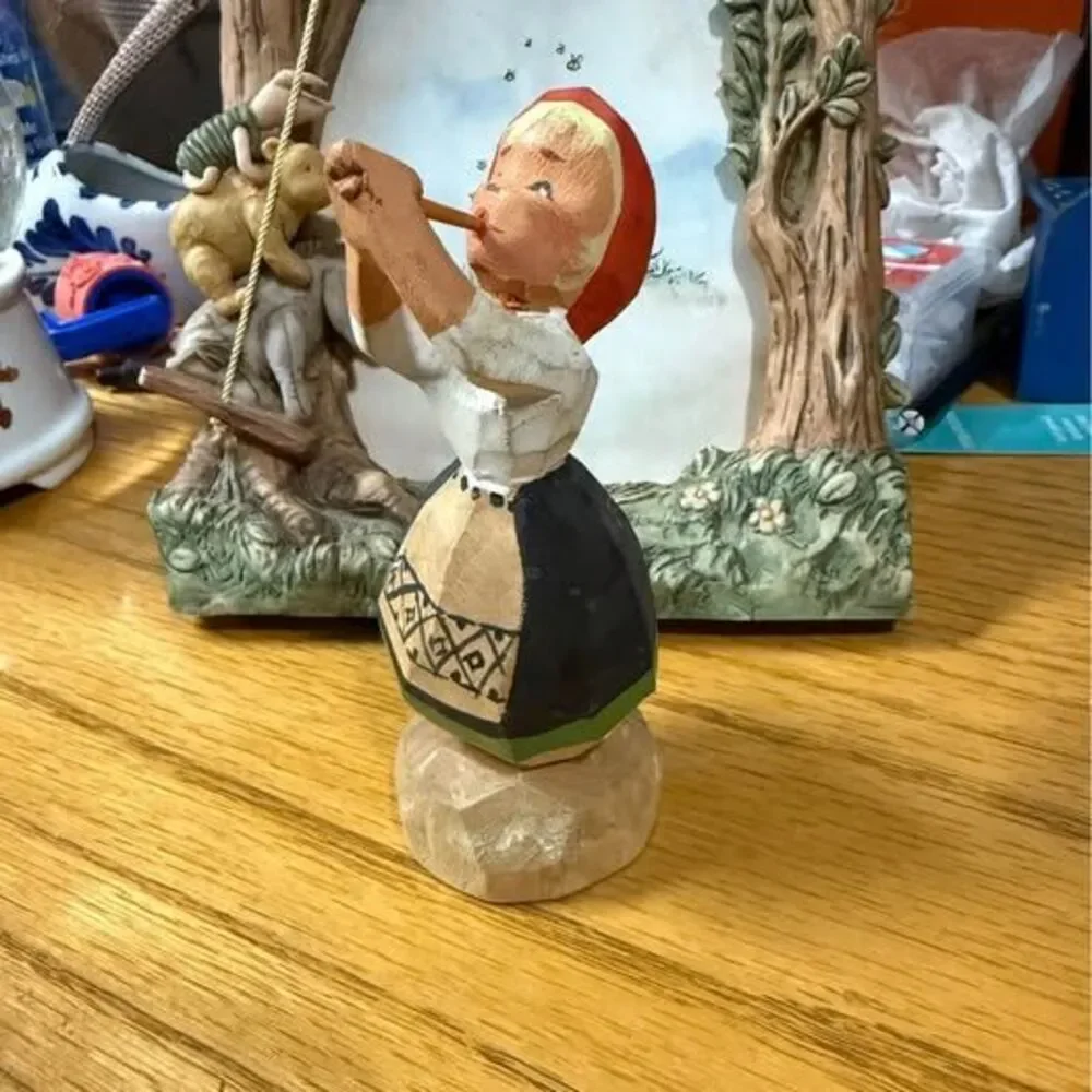 Cute hand carved Norwegian girl